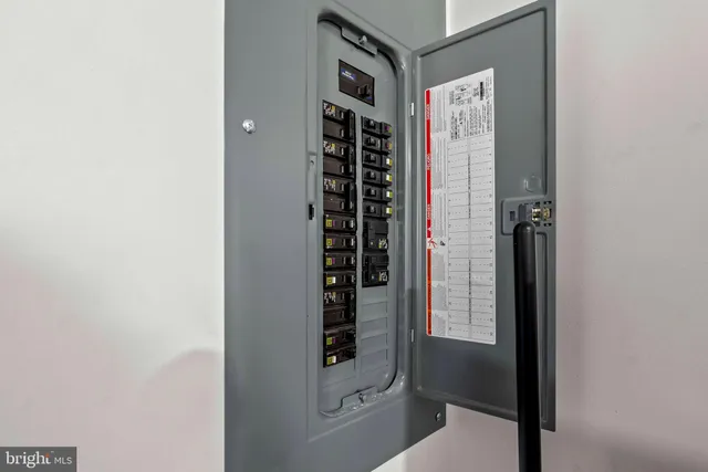 a front view of a house with parking space