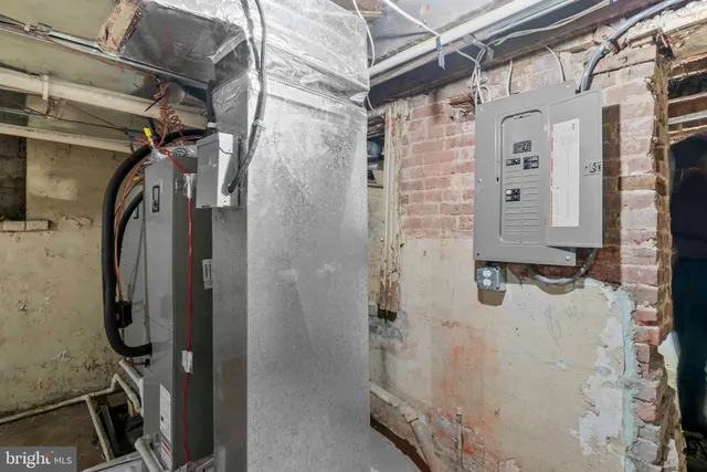 a view of a street with cars on the road