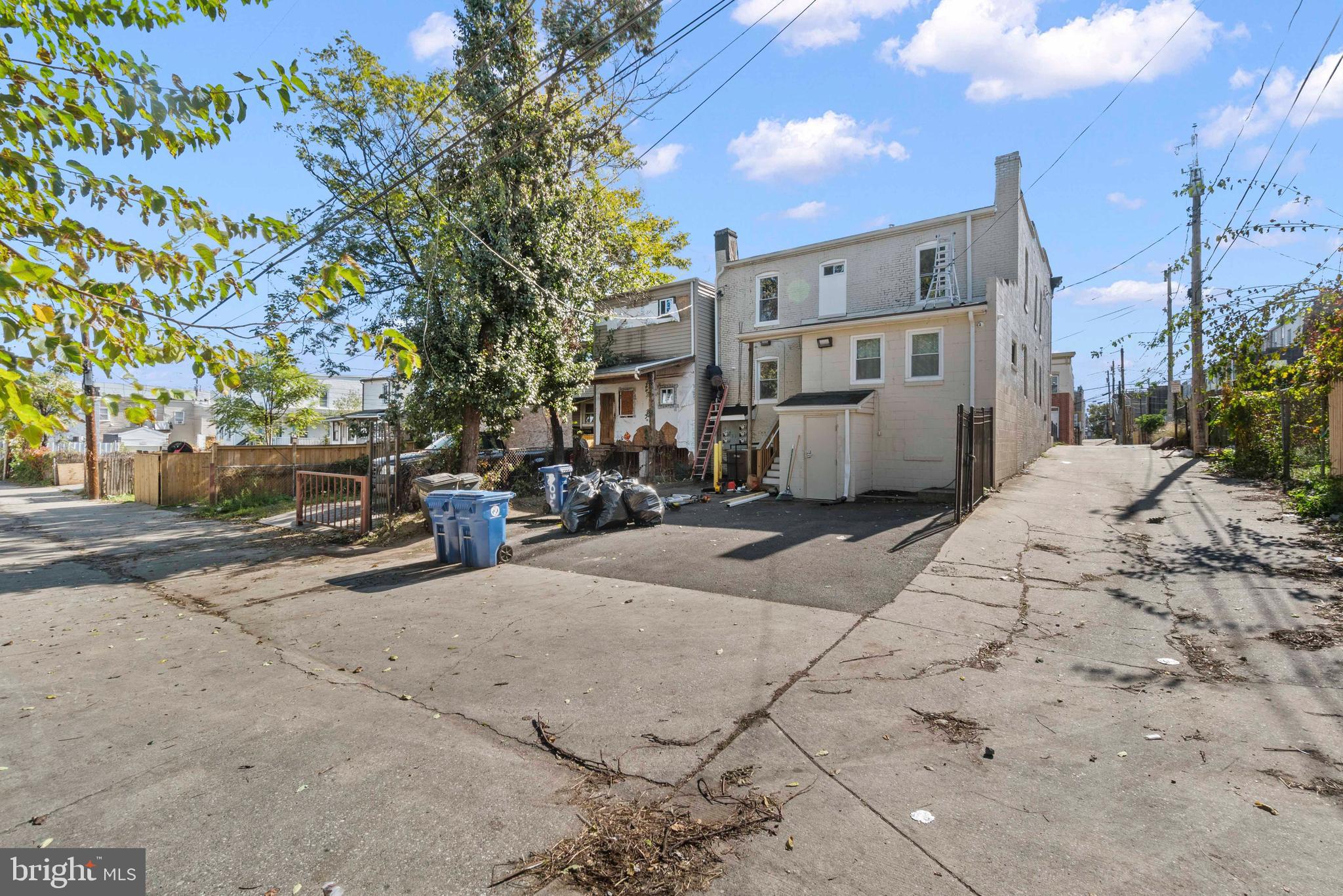1602 Cypress Street Curtis Bay, MD 21226 - Photo 40 of 42 a view of a street with cars on the road