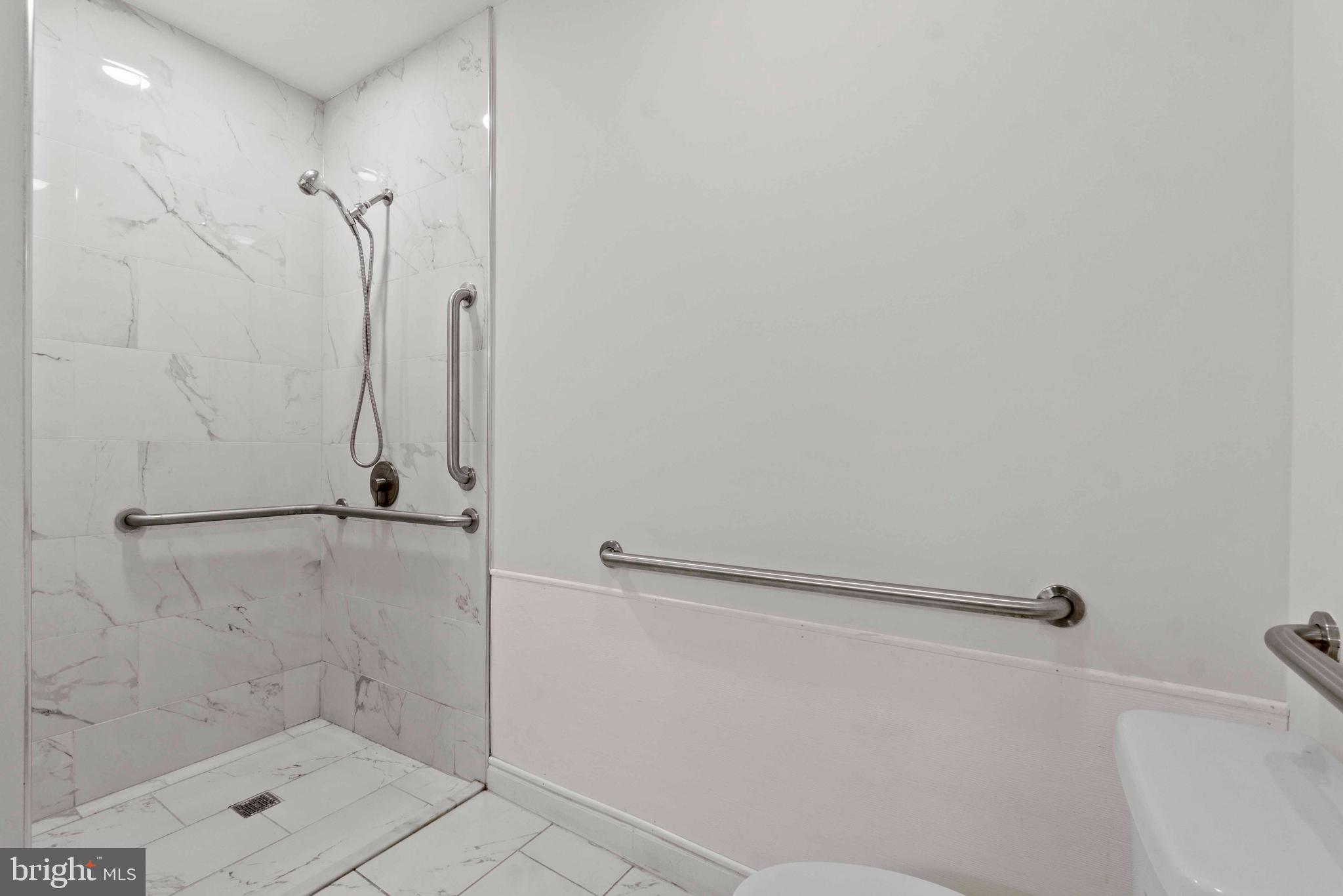 1602 Cypress Street Curtis Bay, MD 21226 - Photo 9 of 42 a bathroom with a shower