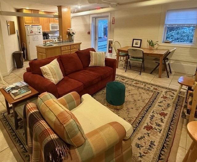 21 Bradlee Road, Unit 52 Medford, MA 02155 - Photo 18 of 22 a living room with furniture and a rug