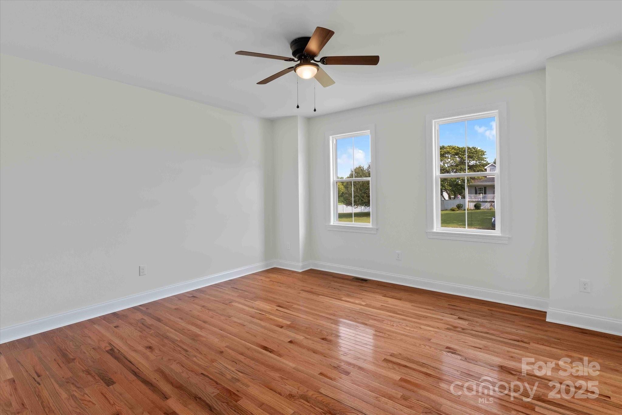 113 Cheval Trail Cleveland, NC 27013 - Photo 23 of 41 a view of an empty room with wooden floor and a window