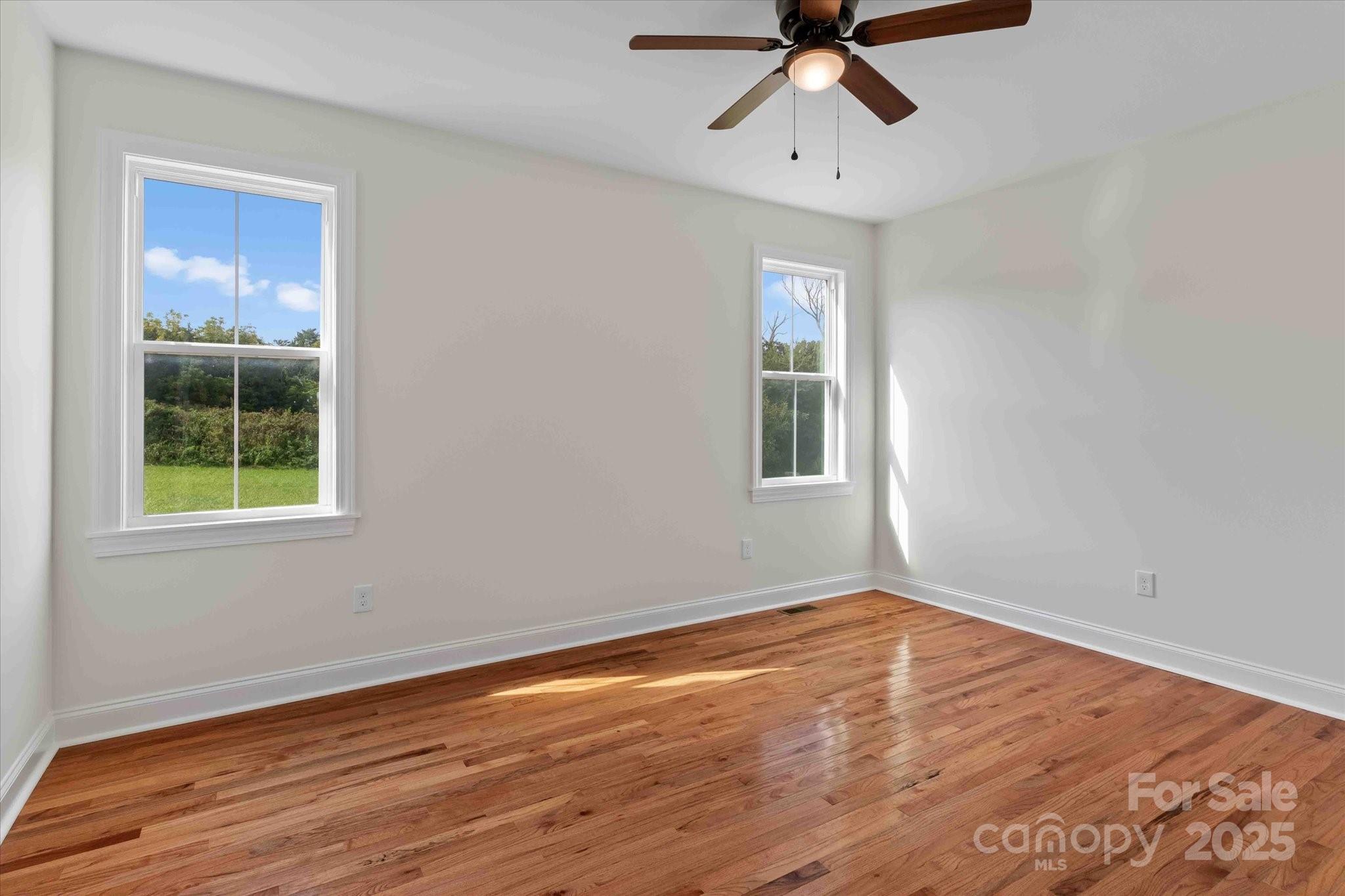 113 Cheval Trail Cleveland, NC 27013 - Photo 30 of 41 a view of an empty room with wooden floor and a window