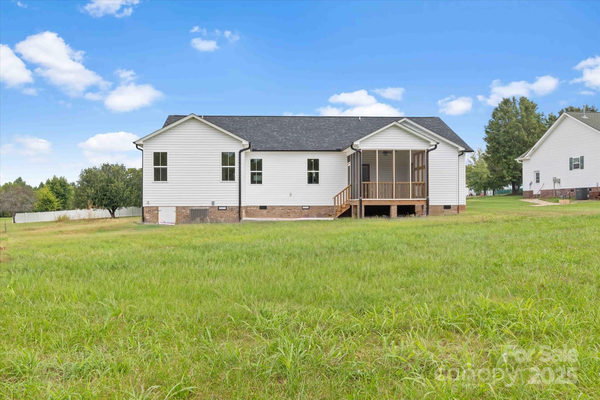 113 Cheval Trail Cleveland, NC 27013 - Photo 41 of 41 a view of a house with a yard and sitting area