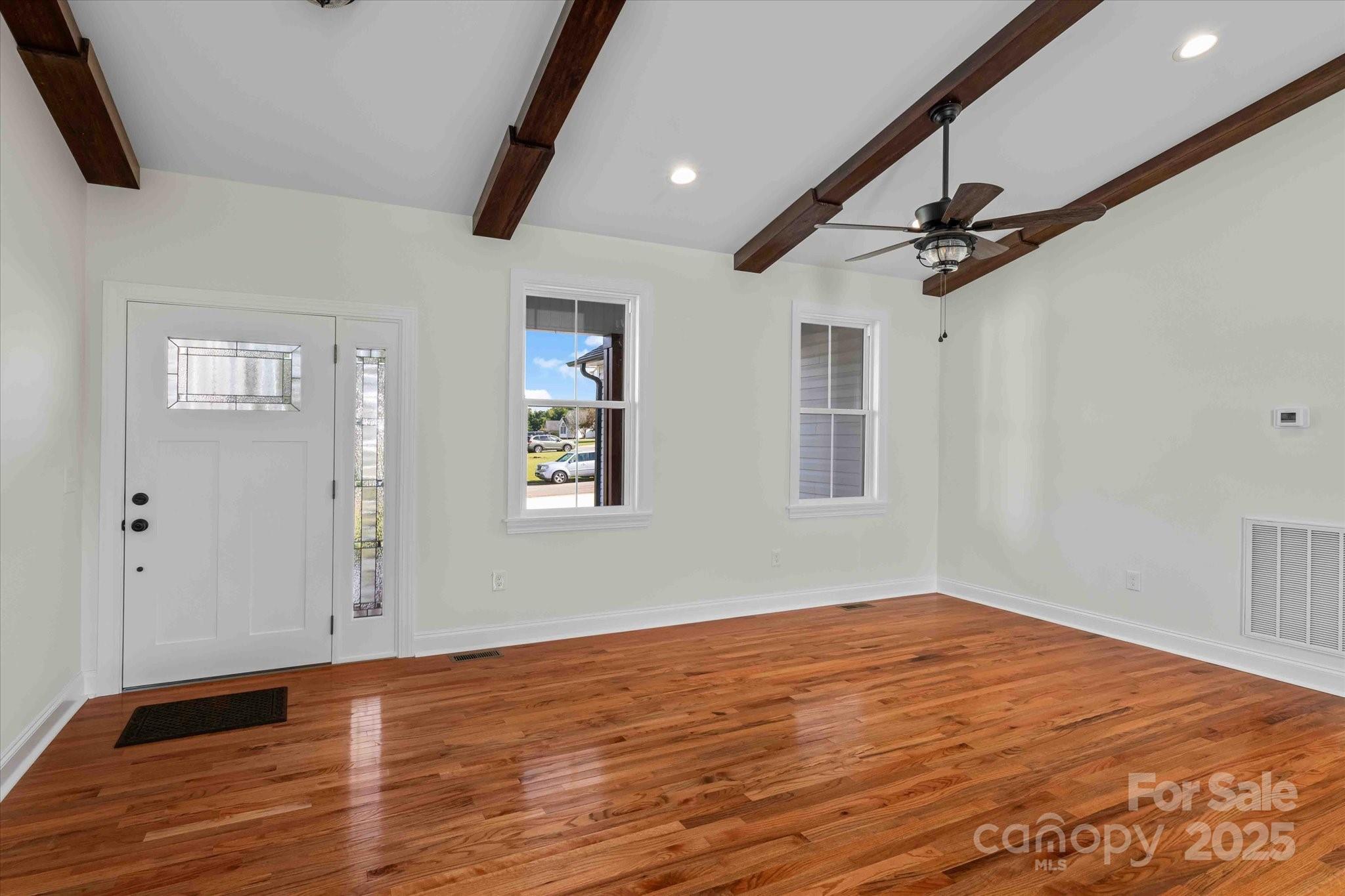 113 Cheval Trail Cleveland, NC 27013 - Photo 6 of 41 a view of empty room with wooden floor and fan
