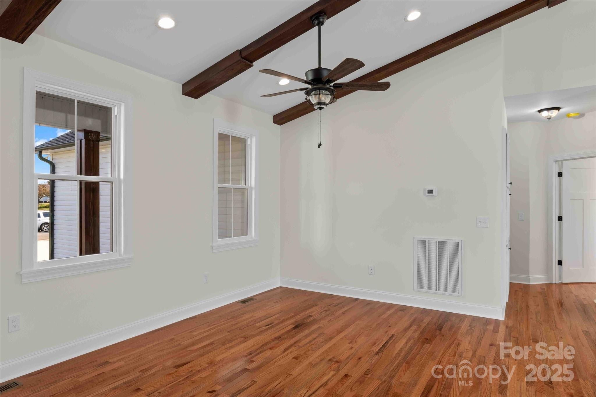113 Cheval Trail Cleveland, NC 27013 - Photo 7 of 41 a view of empty room with wooden floor and fan