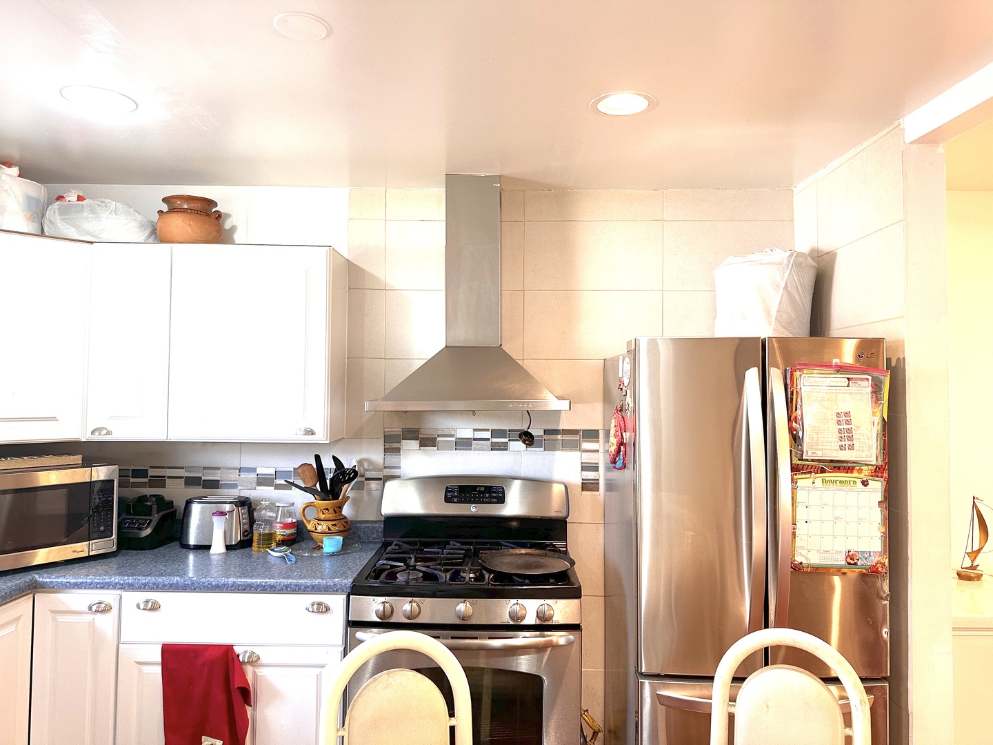 33 Crescent Road Lake Zurich, IL 60047 - Photo 5 of 15 a kitchen with stainless steel appliances granite countertop a stove a sink and a refrigerator