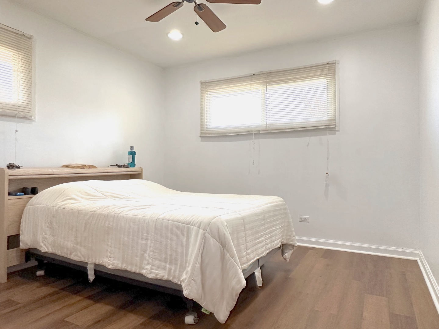 33 Crescent Road Lake Zurich, IL 60047 - Photo 7 of 15 a bedroom with a bed and window
