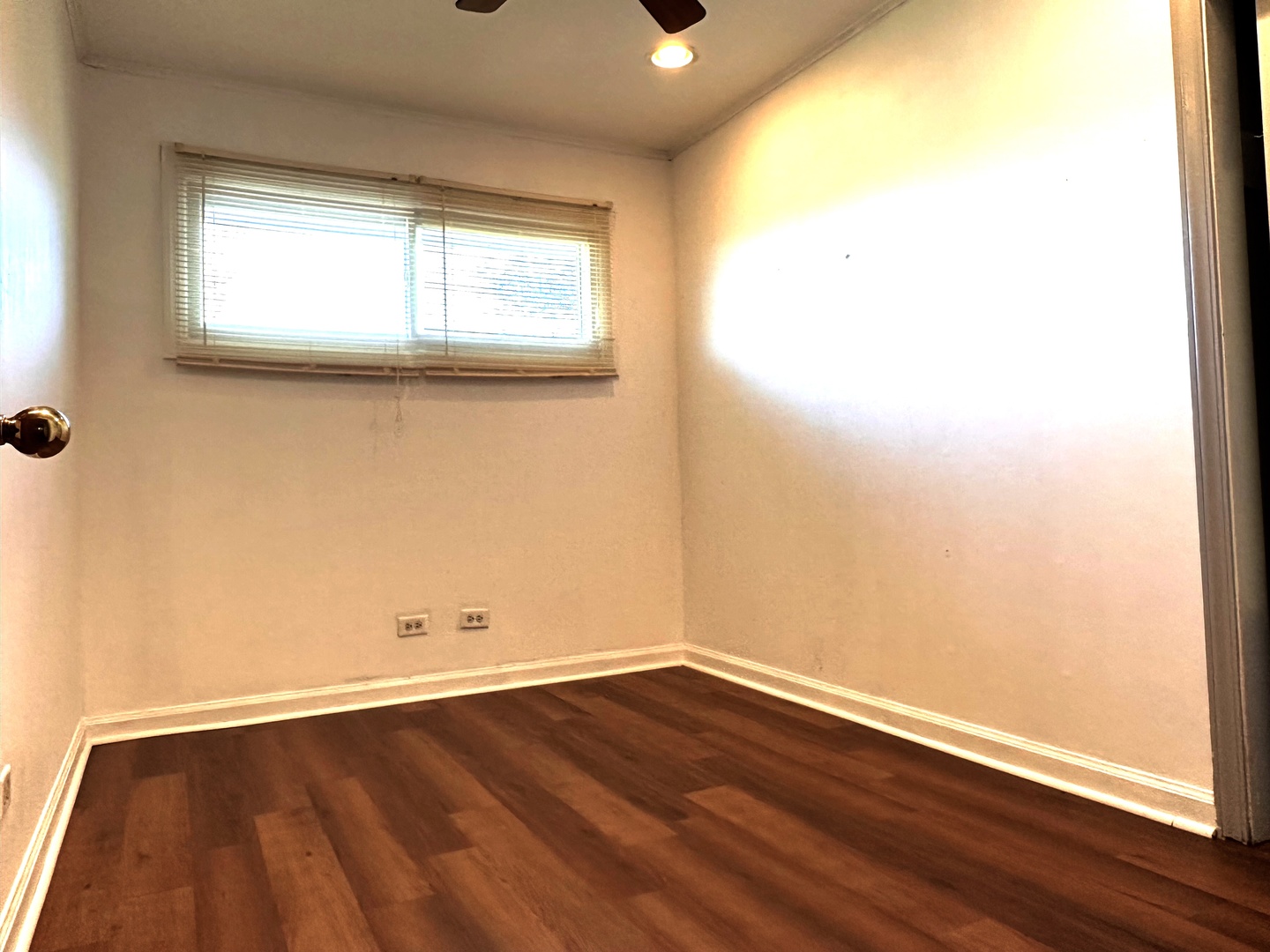 33 Crescent Road Lake Zurich, IL 60047 - Photo 9 of 15 an empty room with wooden floor and windows