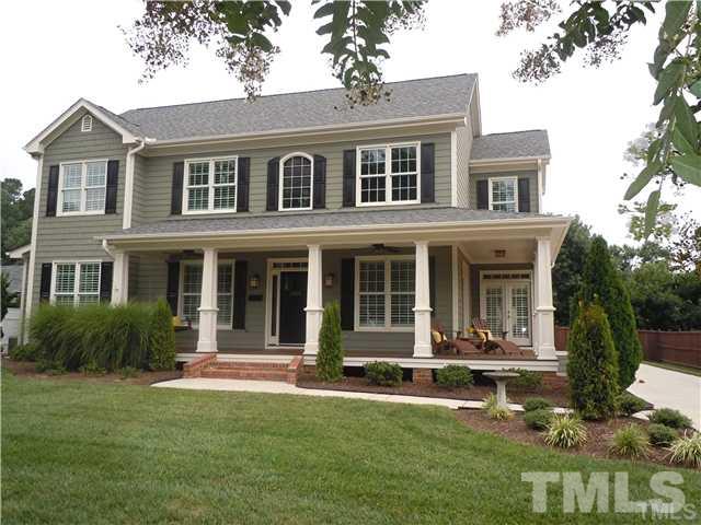 1305 Lions Way Raleigh, NC 27604 - Photo 1 of 25 a front view of a house with a yard
