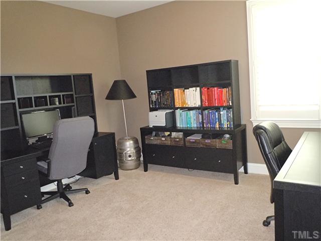 1305 Lions Way Raleigh, NC 27604 - Photo 16 of 25 a room with furniture and window