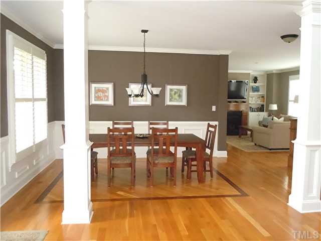 1305 Lions Way Raleigh, NC 27604 - Photo 5 of 25 a view of a dining room with furniture
