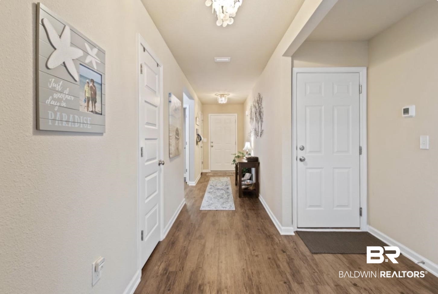 1676 Abbey Loop Foley, AL 36535 - Photo 4 of 31 Inviting hallway featuring wood-finish flooring, light-toned walls, white trim, and recessed lighting