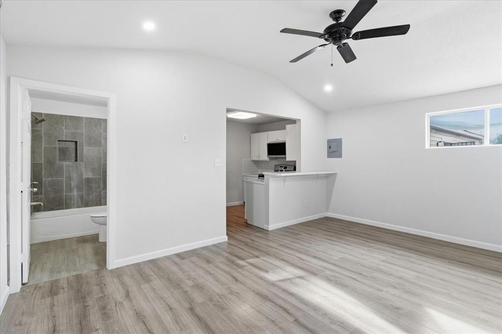 404 South Murray Street McKinney, TX 75069 - Photo 19 of 24 a view of kitchen with sink and microwave