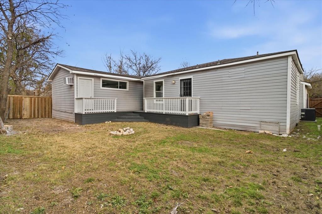 404 South Murray Street McKinney, TX 75069 - Photo 24 of 24 a view of a backyard with a large tree