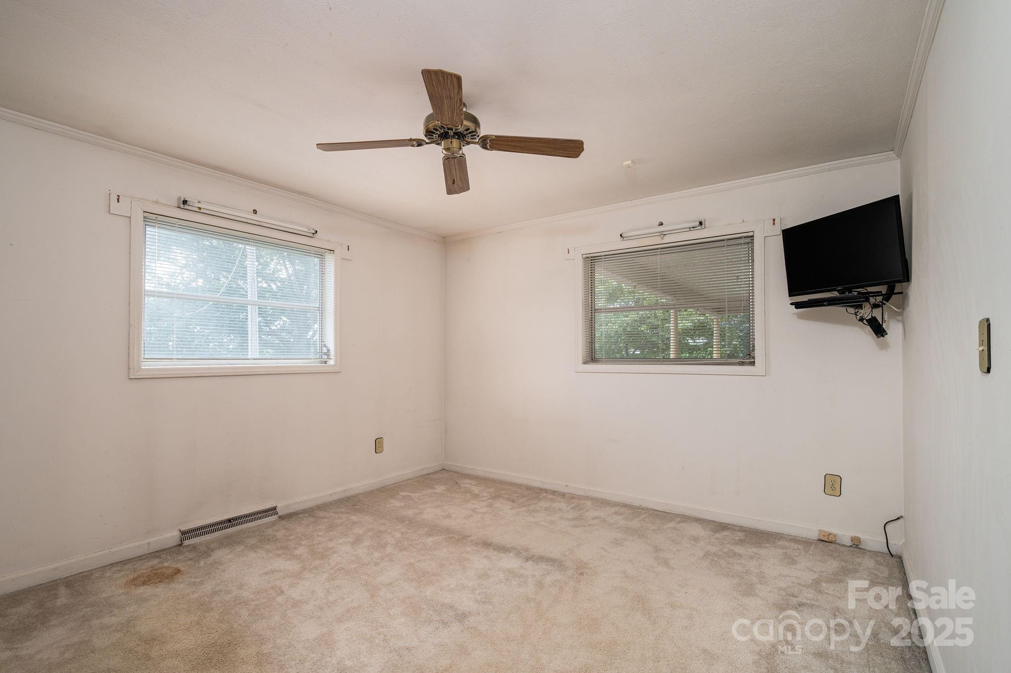 1585 Salem Church Road Lincolnton, NC 28092 - Photo 15 of 31 a view of a livingroom with a flat screen tv