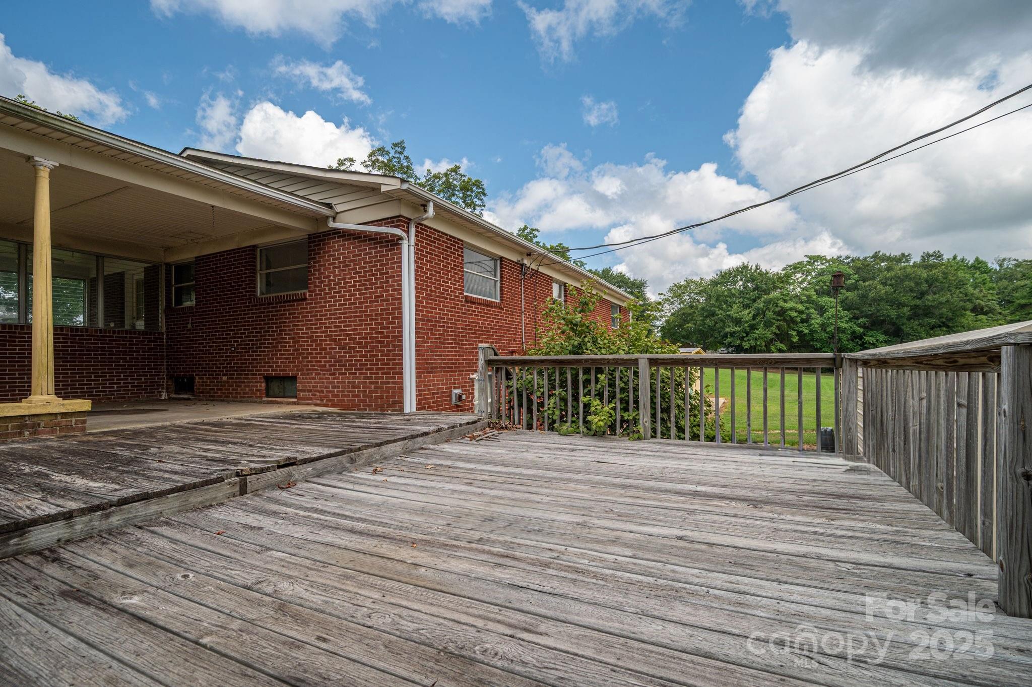 1585 Salem Church Road Lincolnton, NC 28092 - Photo 28 of 31 a view of a house with a wooden deck
