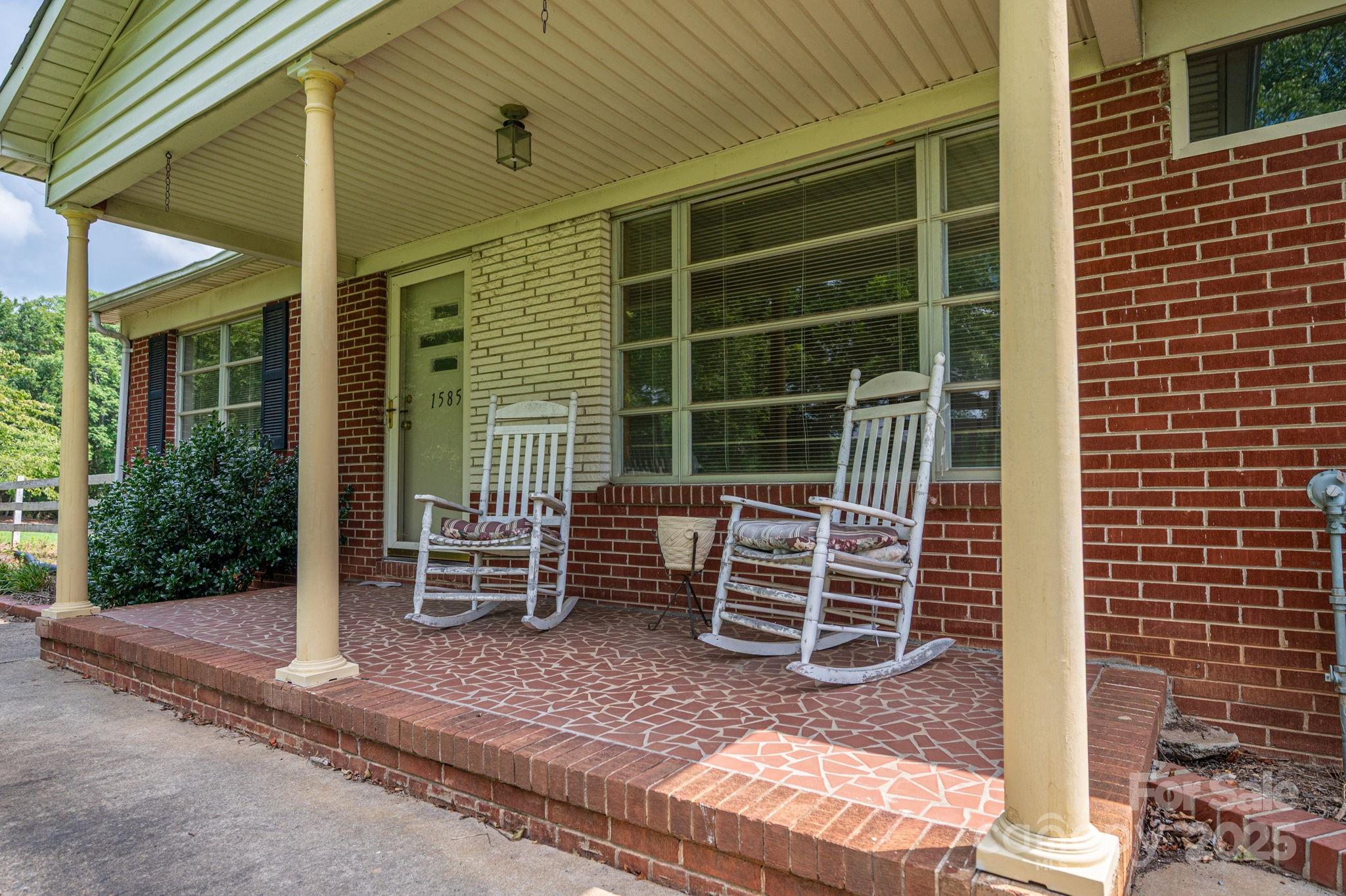 1585 Salem Church Road Lincolnton, NC 28092 - Photo 5 of 31 a backyard of a house with barbeque oven