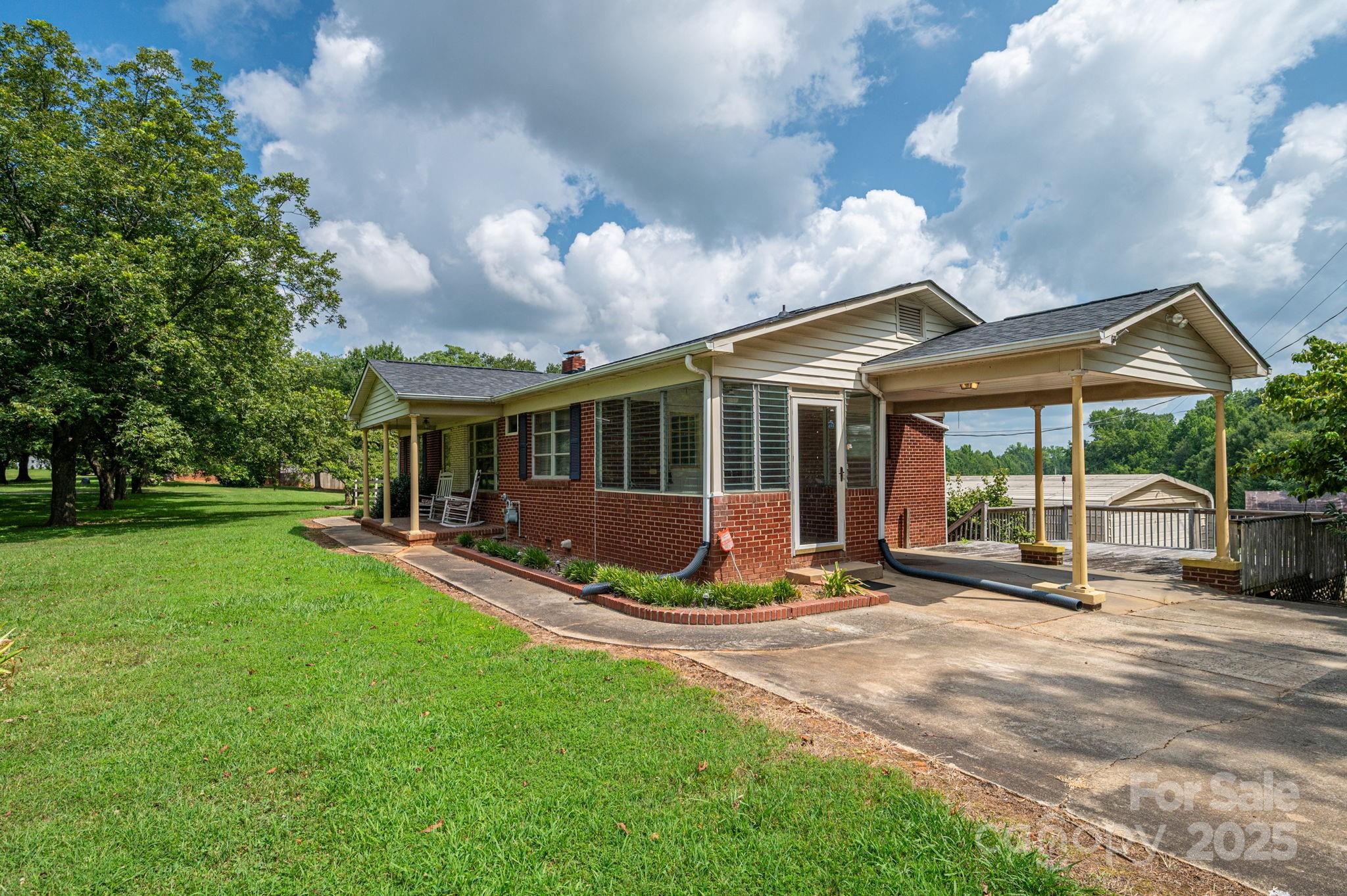 1585 Salem Church Road Lincolnton, NC 28092 - Photo 6 of 31 a view of a house with backyard porch and sitting area
