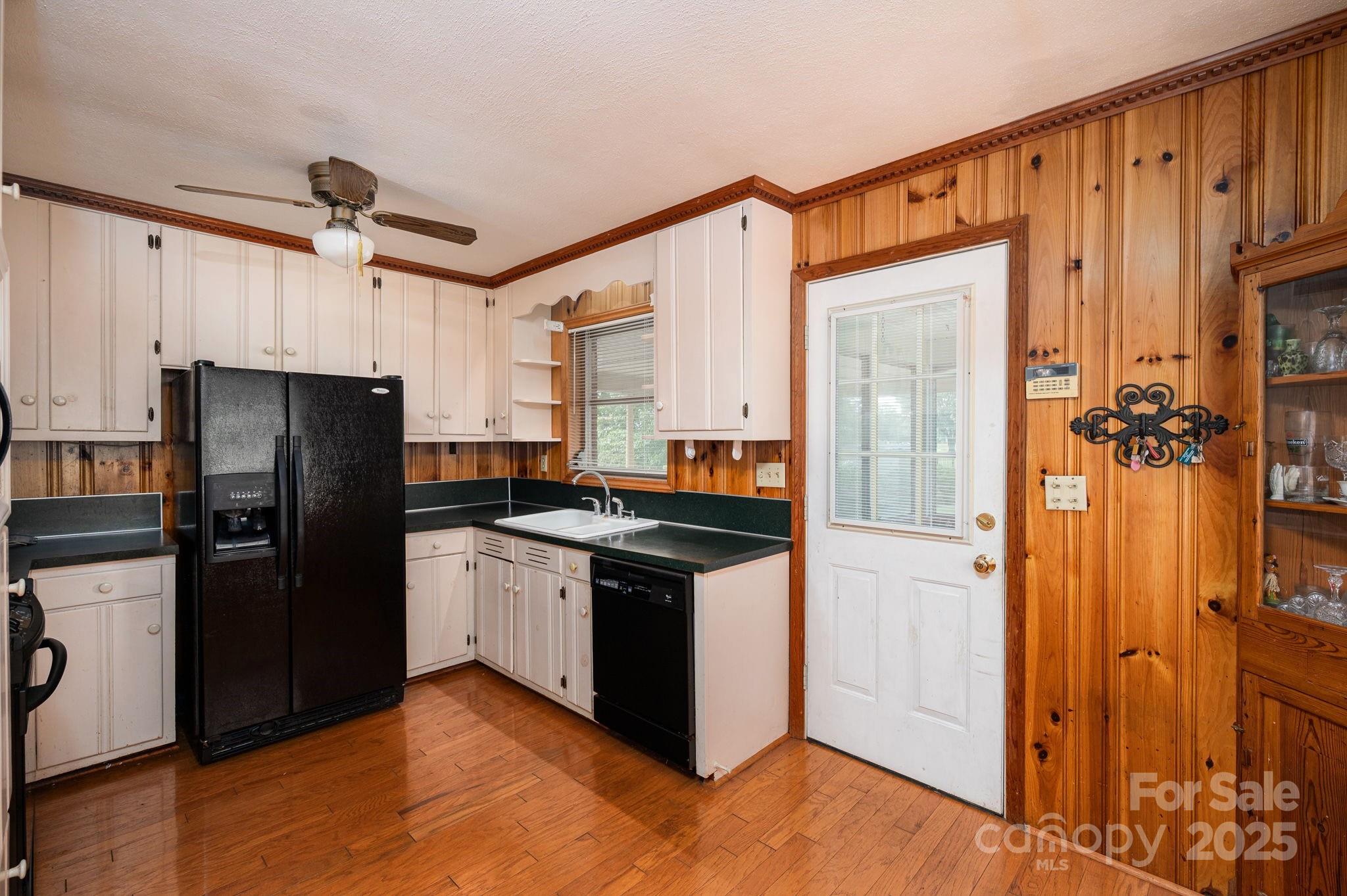 1585 Salem Church Road Lincolnton, NC 28092 - Photo 9 of 31 a kitchen with stainless steel appliances granite countertop a refrigerator a stove and a sink