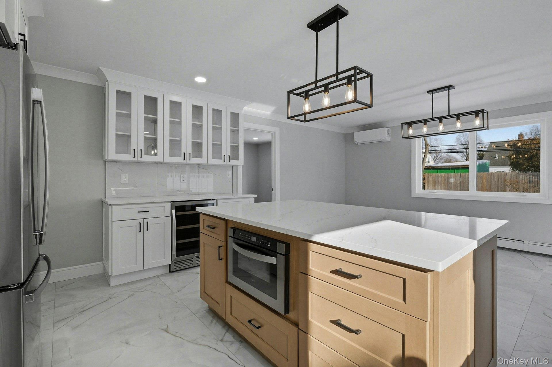 73 Wolcott Road Levittown, NY 11756 - Photo 24 of 31 a kitchen with a stove and a sink