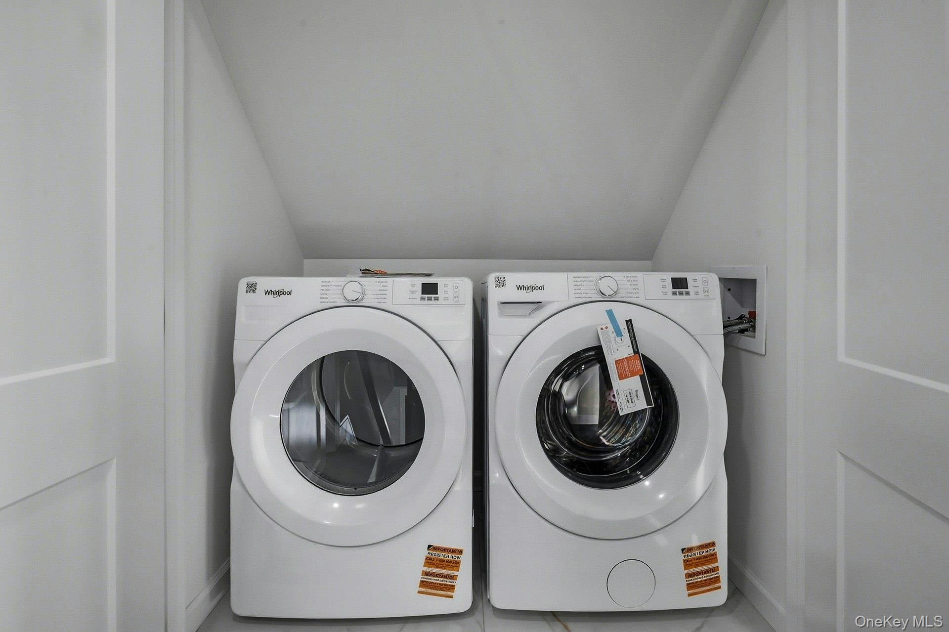 73 Wolcott Road Levittown, NY 11756 - Photo 31 of 31 a utility room with dryer and washer