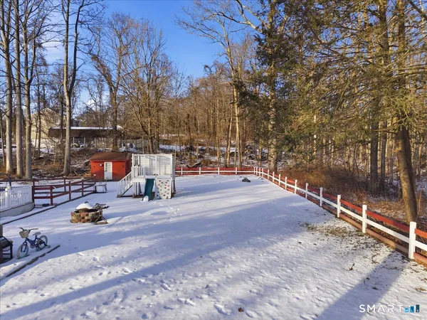 a bench is sitting in middle of a yard
