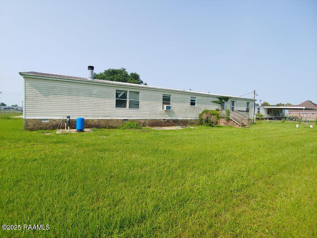 209 Rue Des Etoiles Carencro, LA 70520 - Photo 23 of 25 23 Rear View-