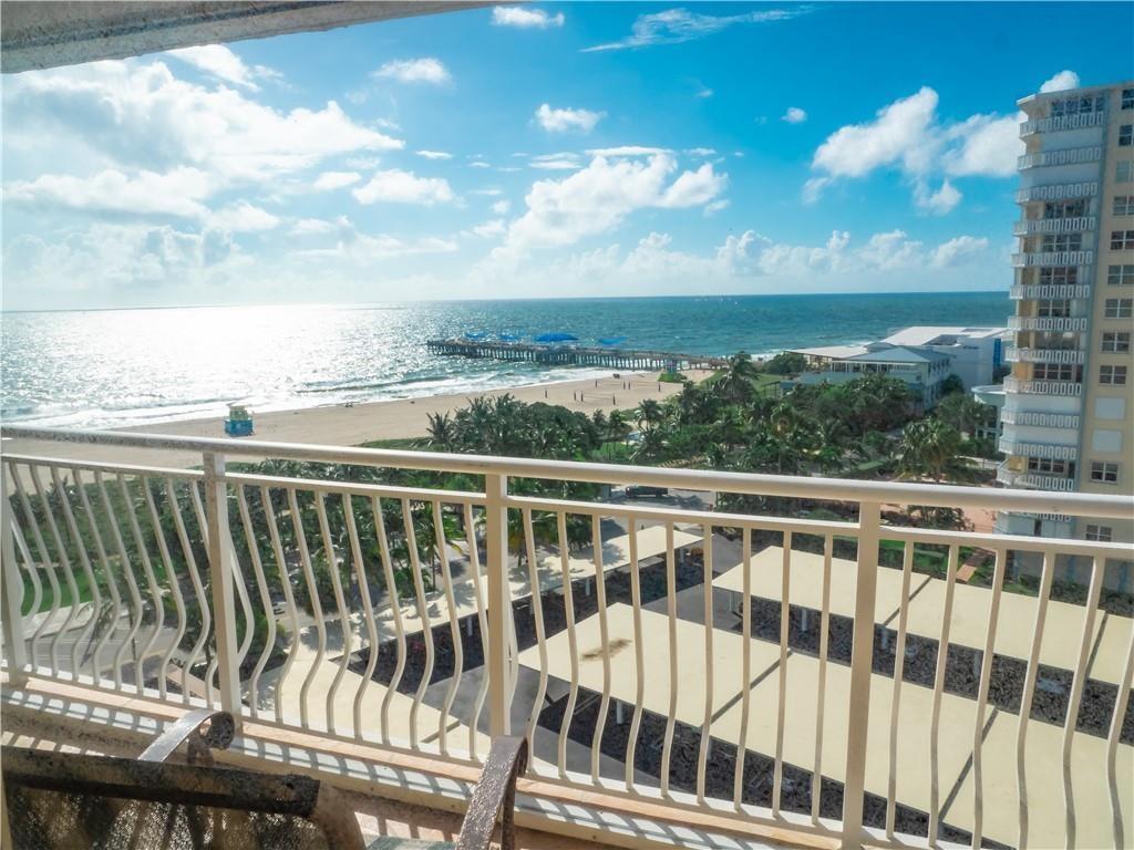 328 North Ocean Boulevard, Unit 1008 Pompano Beach, FL 33062 - Photo 20 of 38 a view of a balcony with wooden floor & fence and city view