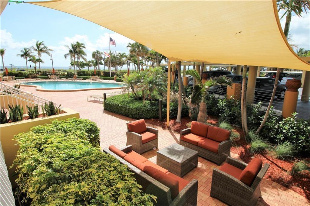 328 North Ocean Boulevard, Unit 1008 Pompano Beach, FL 33062 - Photo 25 of 38 a outdoor living room with furniture
