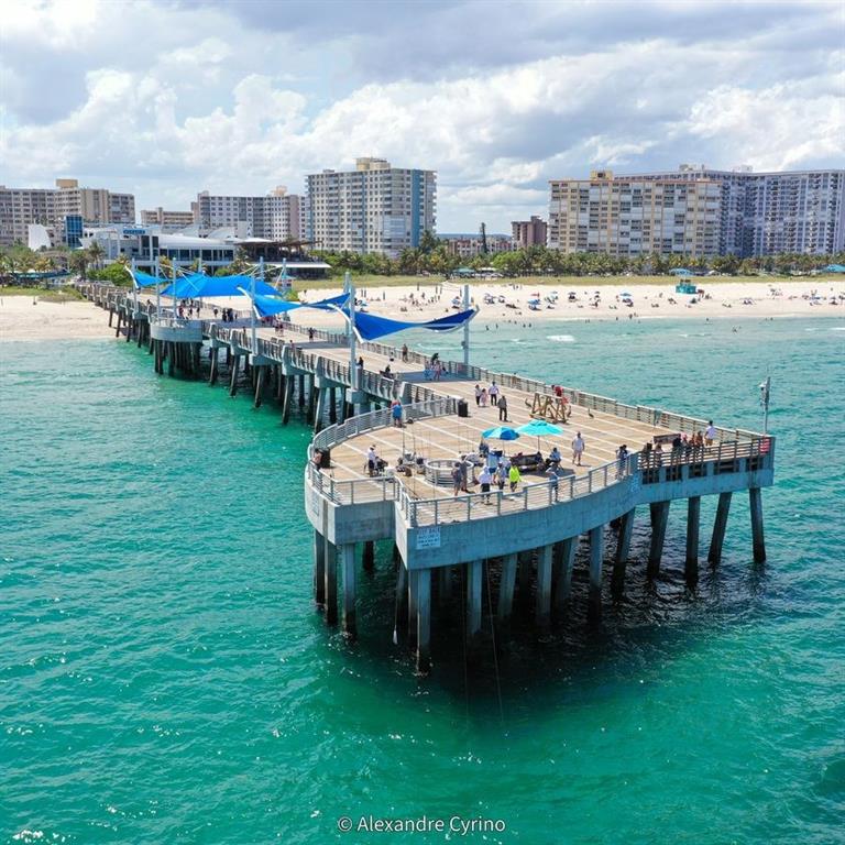 328 North Ocean Boulevard, Unit 1008 Pompano Beach, FL 33062 - Photo 34 of 38 a view of a chairs and table in the patio