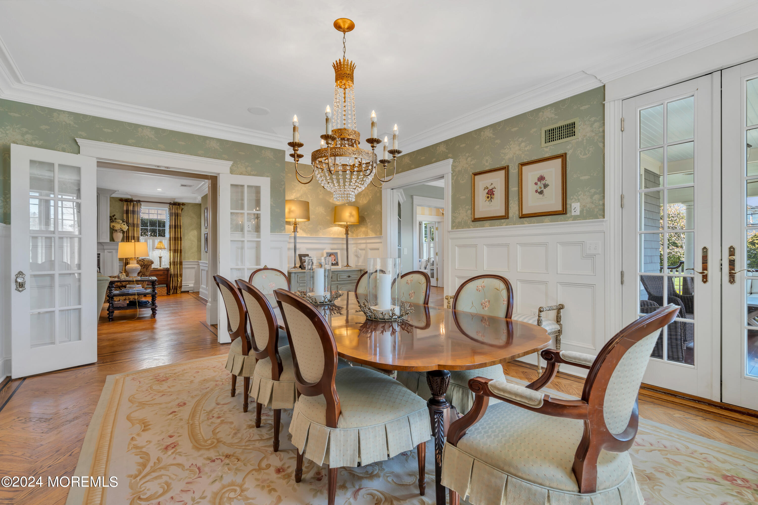 801 5th Avenue Spring Lake, NJ 07762 - Photo 18 of 97 a dining room with furniture a chandelier and wooden floor