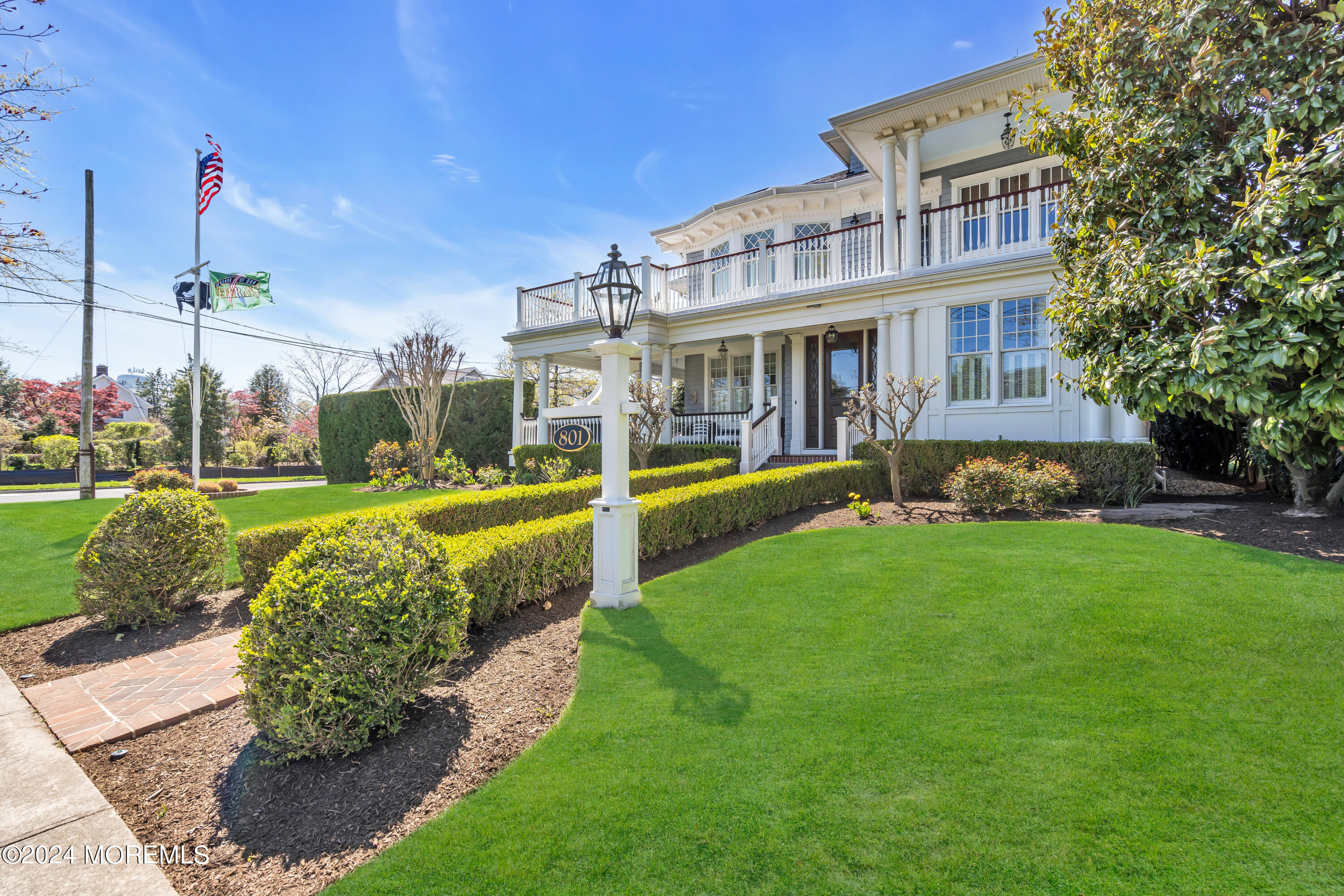 801 5th Avenue Spring Lake, NJ 07762 - Photo 3 of 97 a front view of a house with a yard