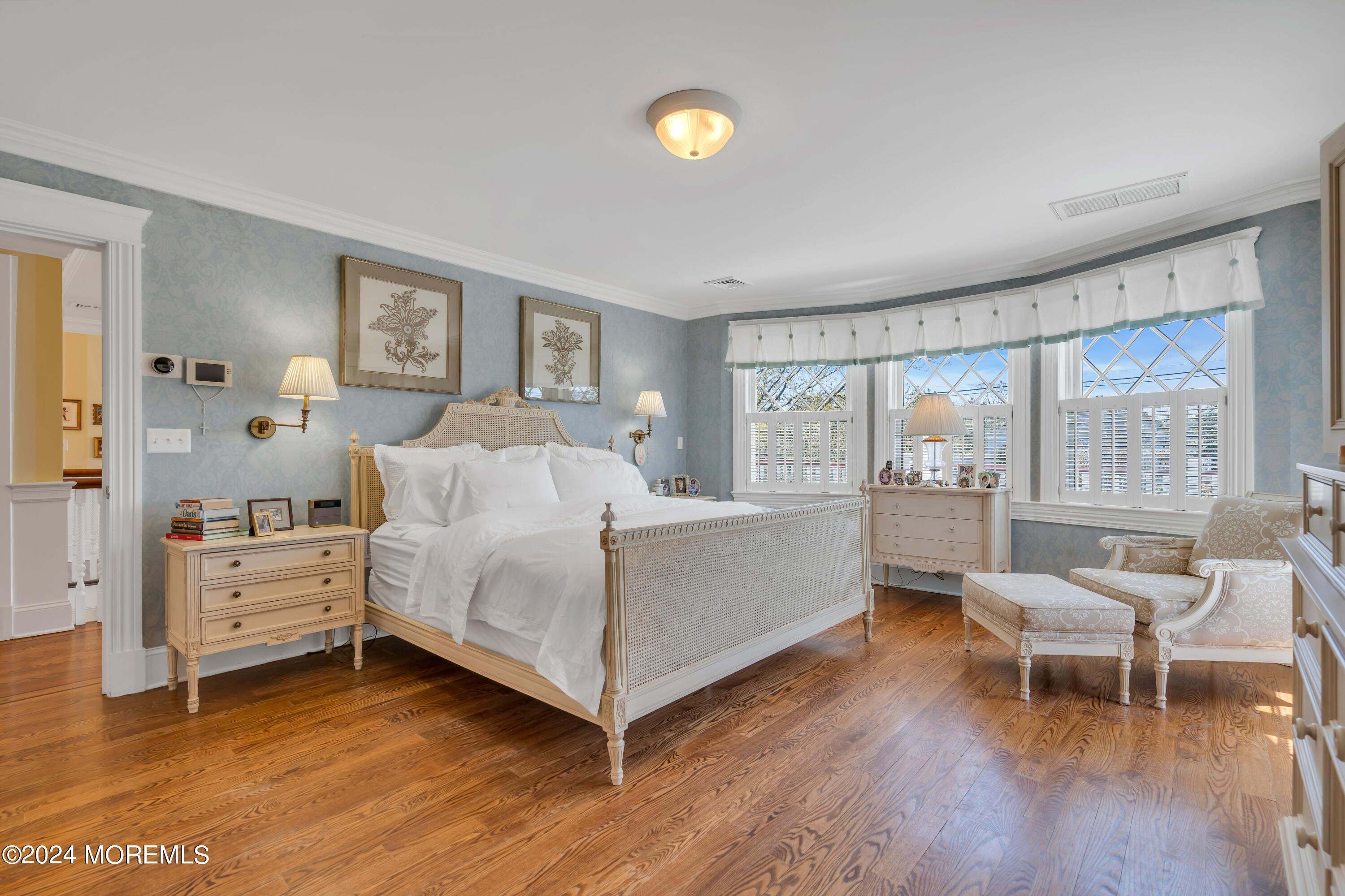 801 5th Avenue Spring Lake, NJ 07762 - Photo 41 of 97 a bed room with a bed and a chair