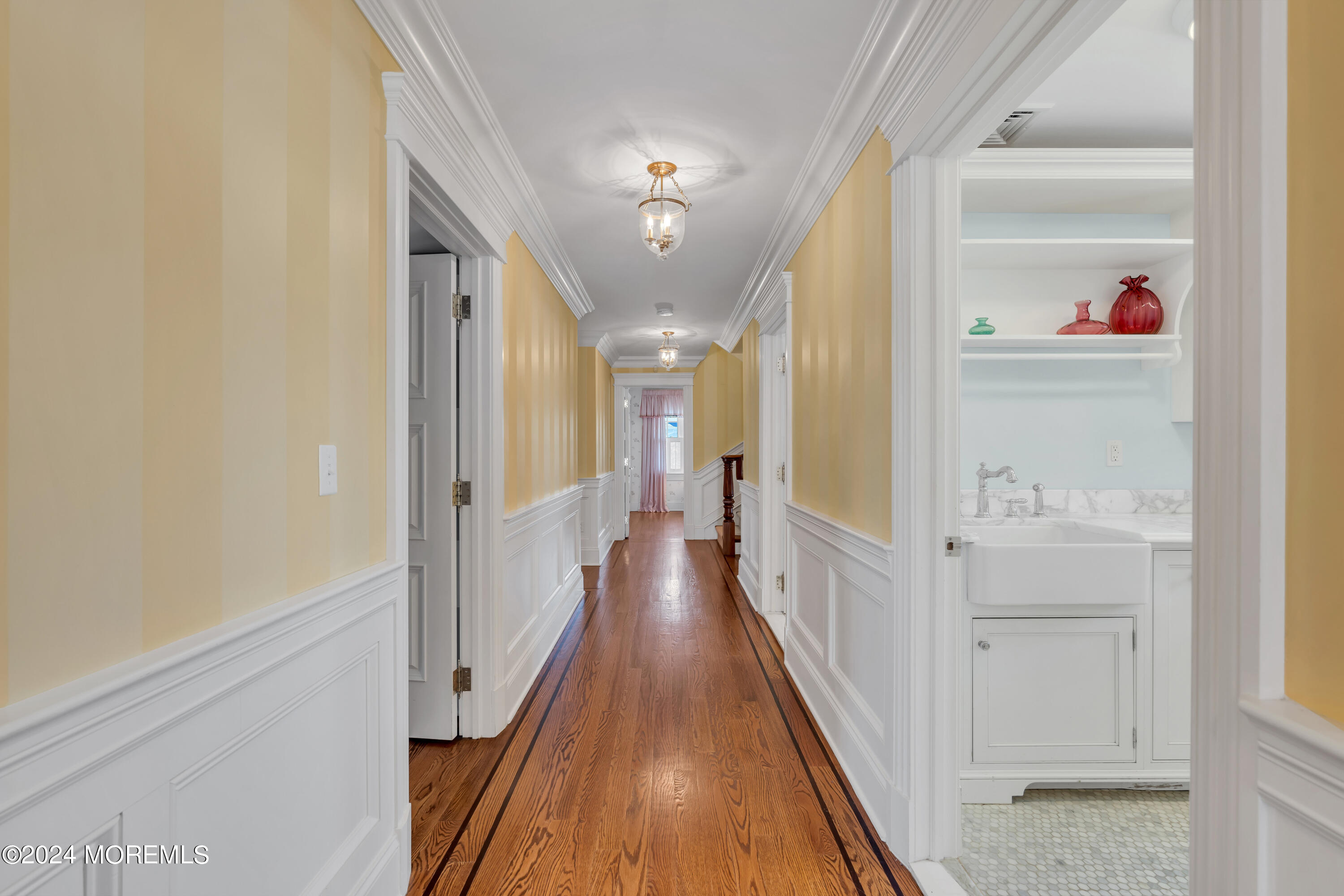 801 5th Avenue Spring Lake, NJ 07762 - Photo 47 of 97 a view of a hallway with wooden floor