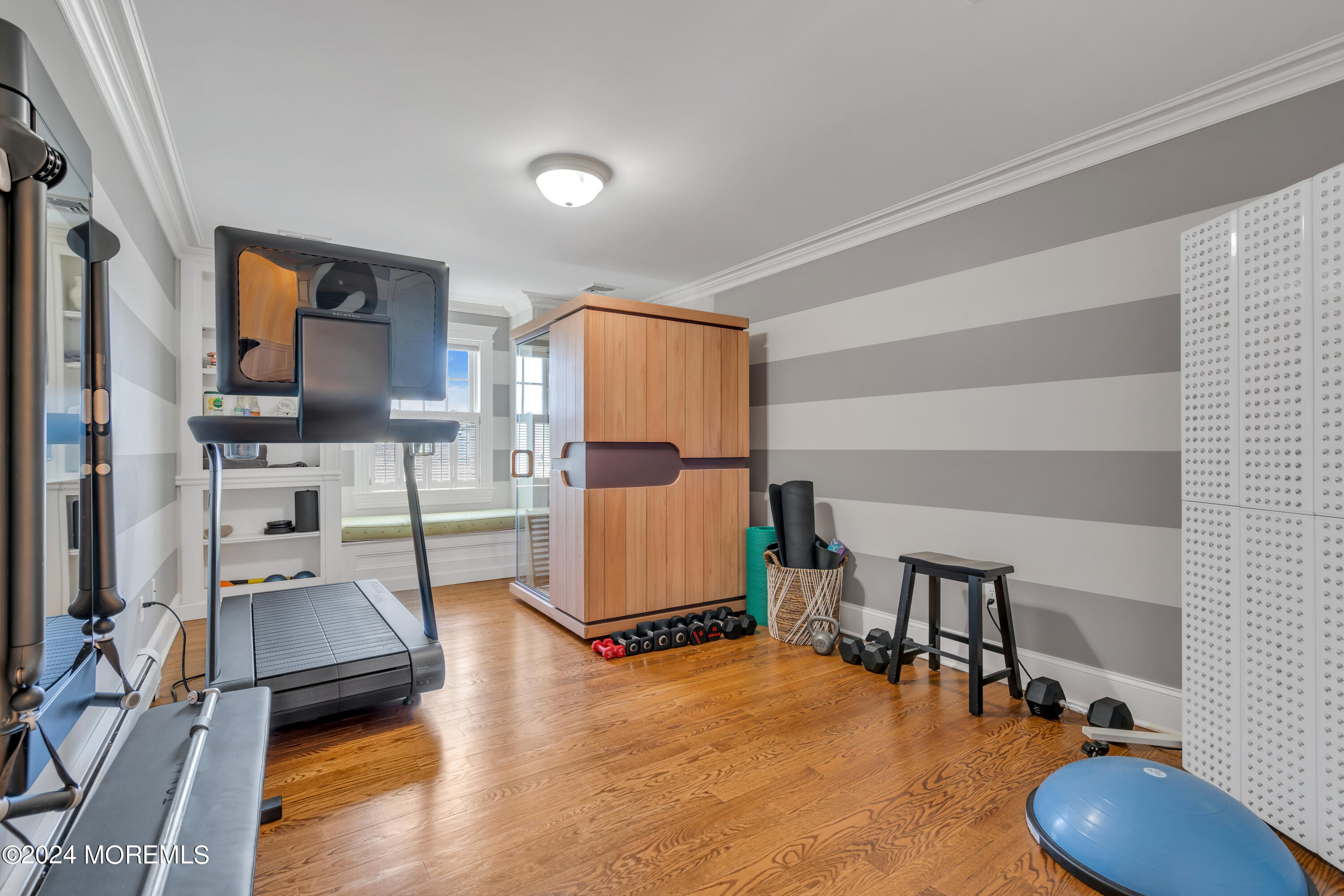 801 5th Avenue Spring Lake, NJ 07762 - Photo 56 of 97 a room with furniture and a flat screen tv