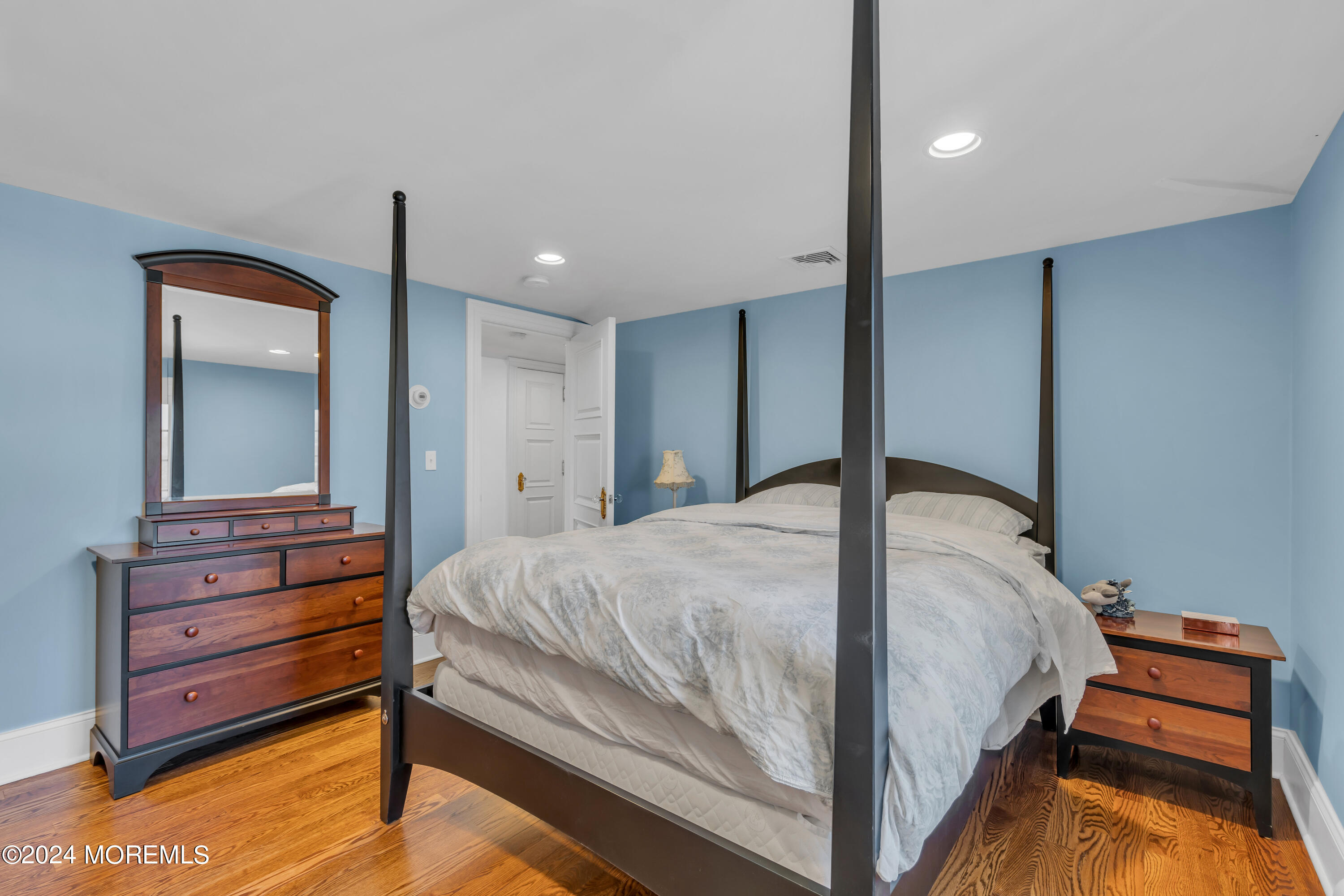 801 5th Avenue Spring Lake, NJ 07762 - Photo 62 of 97 a bed room with a bed and a dresser