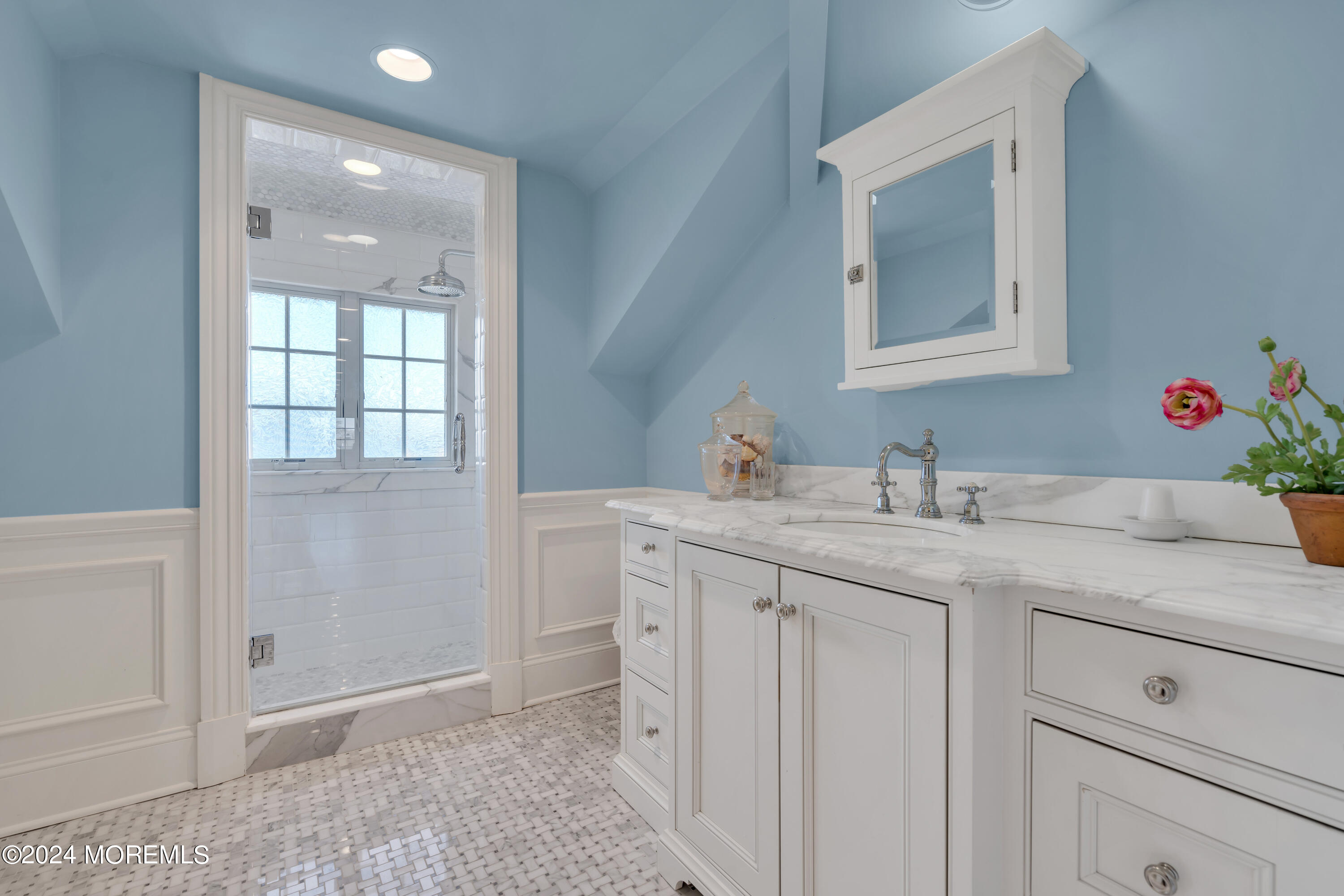 801 5th Avenue Spring Lake, NJ 07762 - Photo 67 of 97 a bathroom with a sink and a mirror