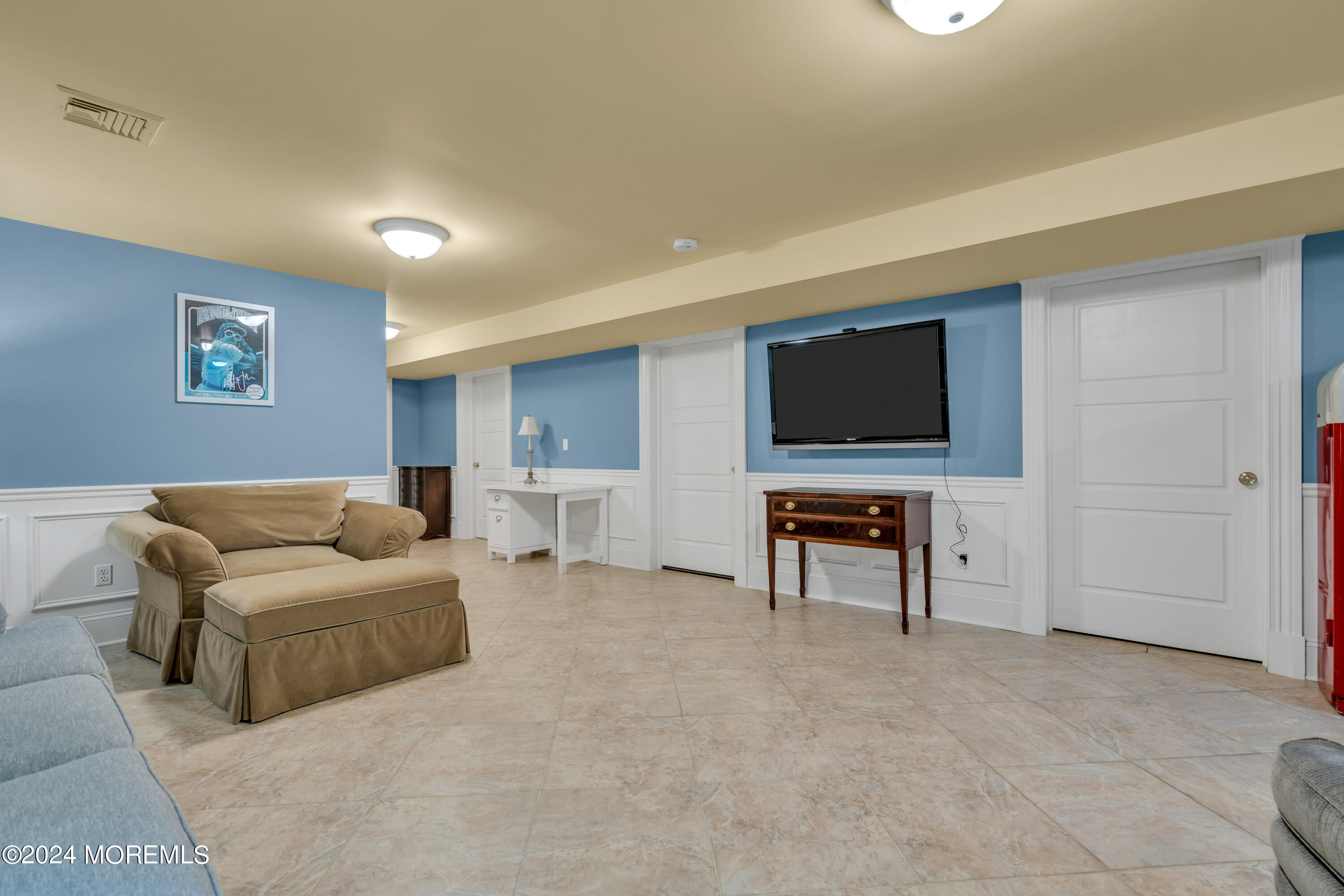 801 5th Avenue Spring Lake, NJ 07762 - Photo 71 of 97 a living room with furniture and a flat screen tv