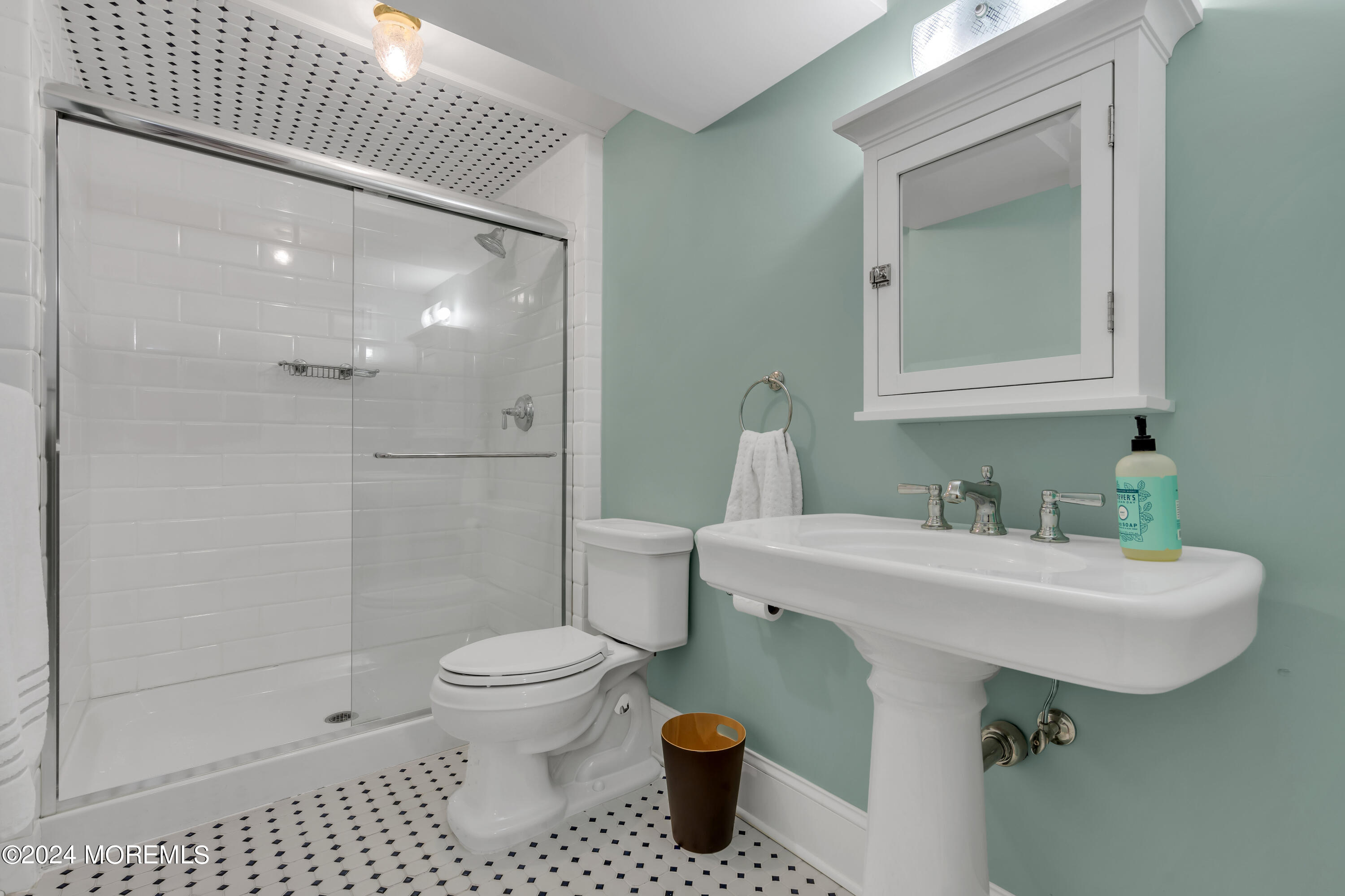 801 5th Avenue Spring Lake, NJ 07762 - Photo 78 of 97 a bathroom with a sink a toilet and shower