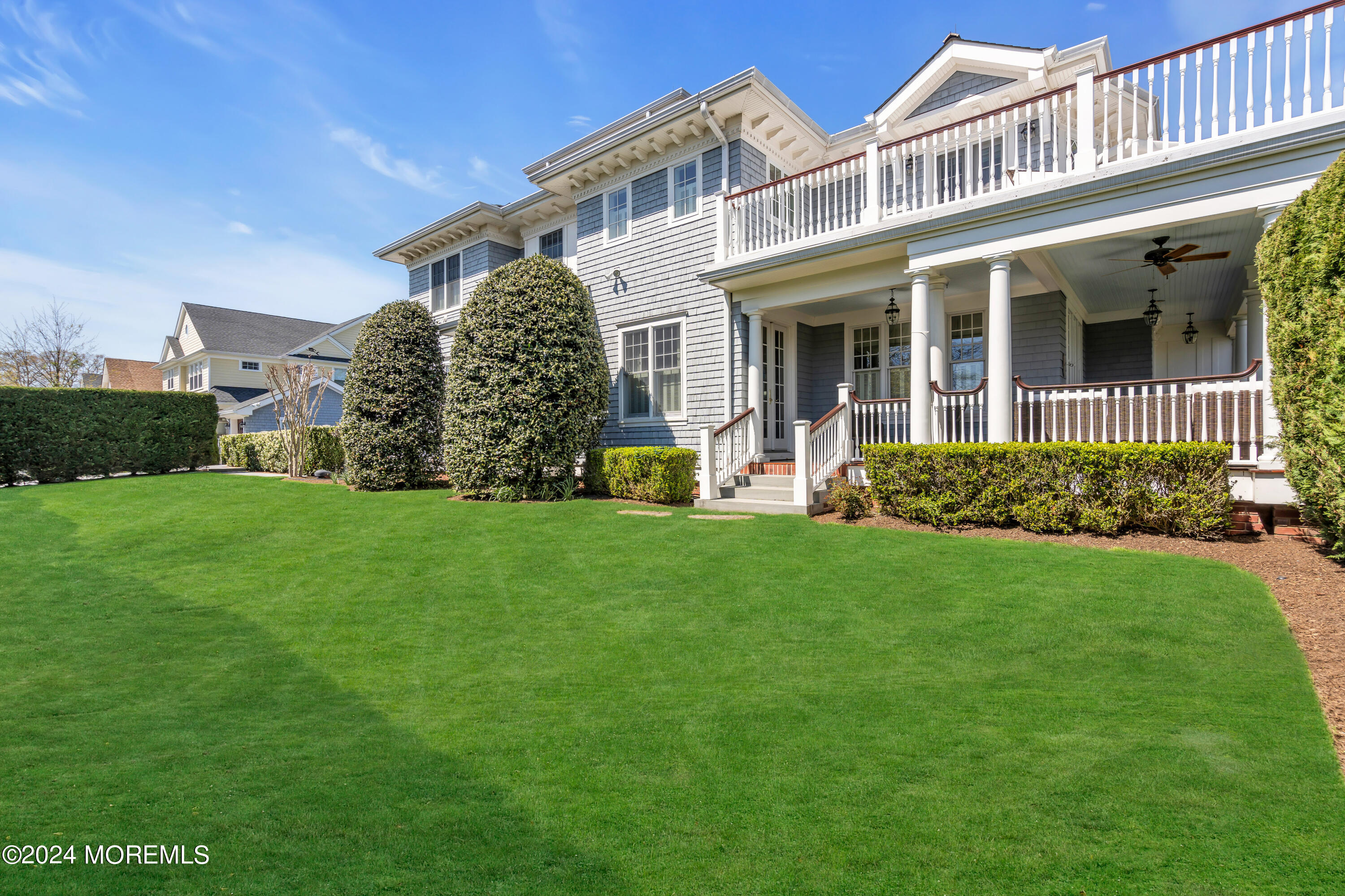 801 5th Avenue Spring Lake, NJ 07762 - Photo 85 of 97 a view of a house with a yard and plants