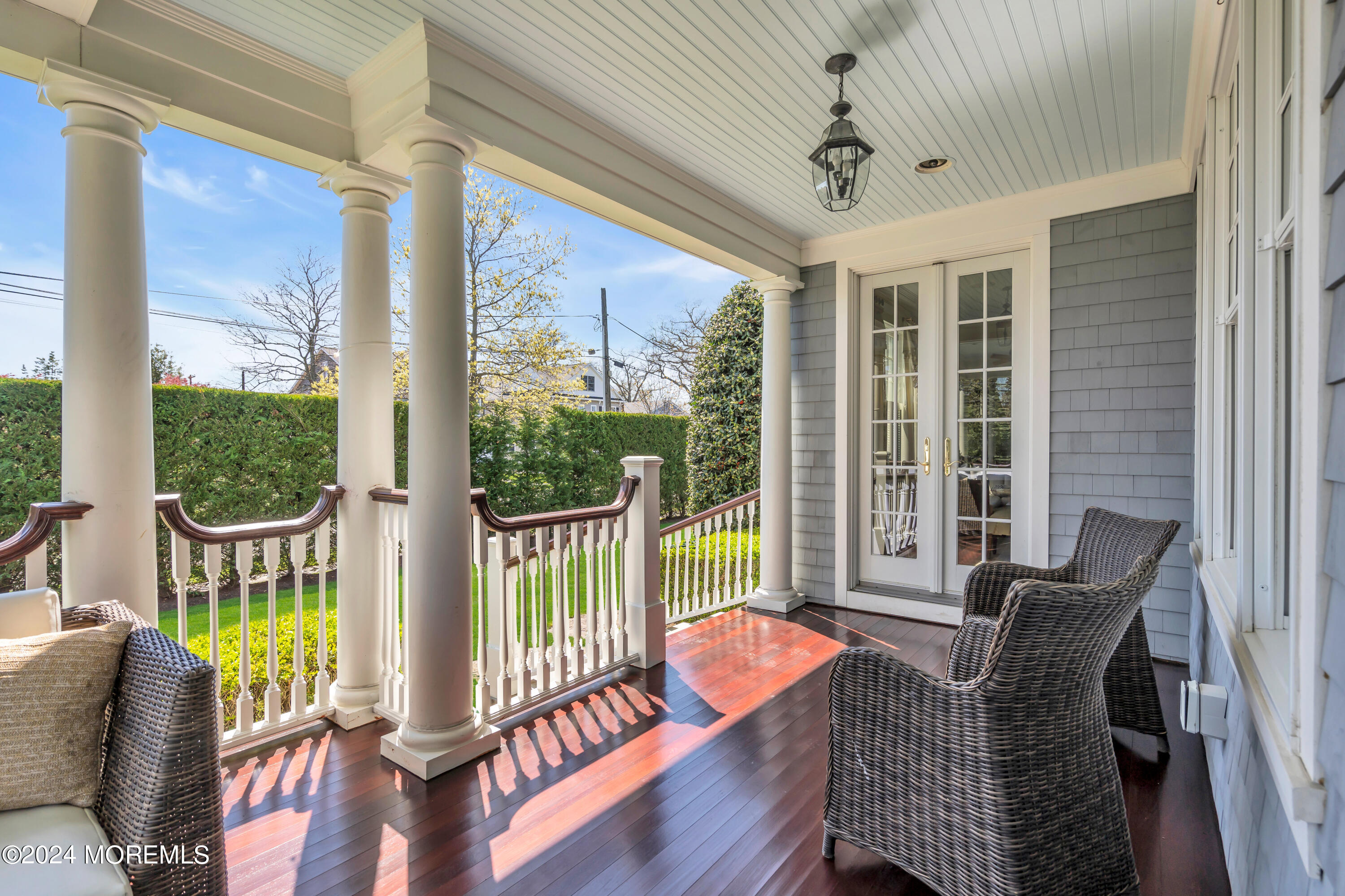 801 5th Avenue Spring Lake, NJ 07762 - Photo 88 of 97 a living room with furniture and a floor to ceiling window