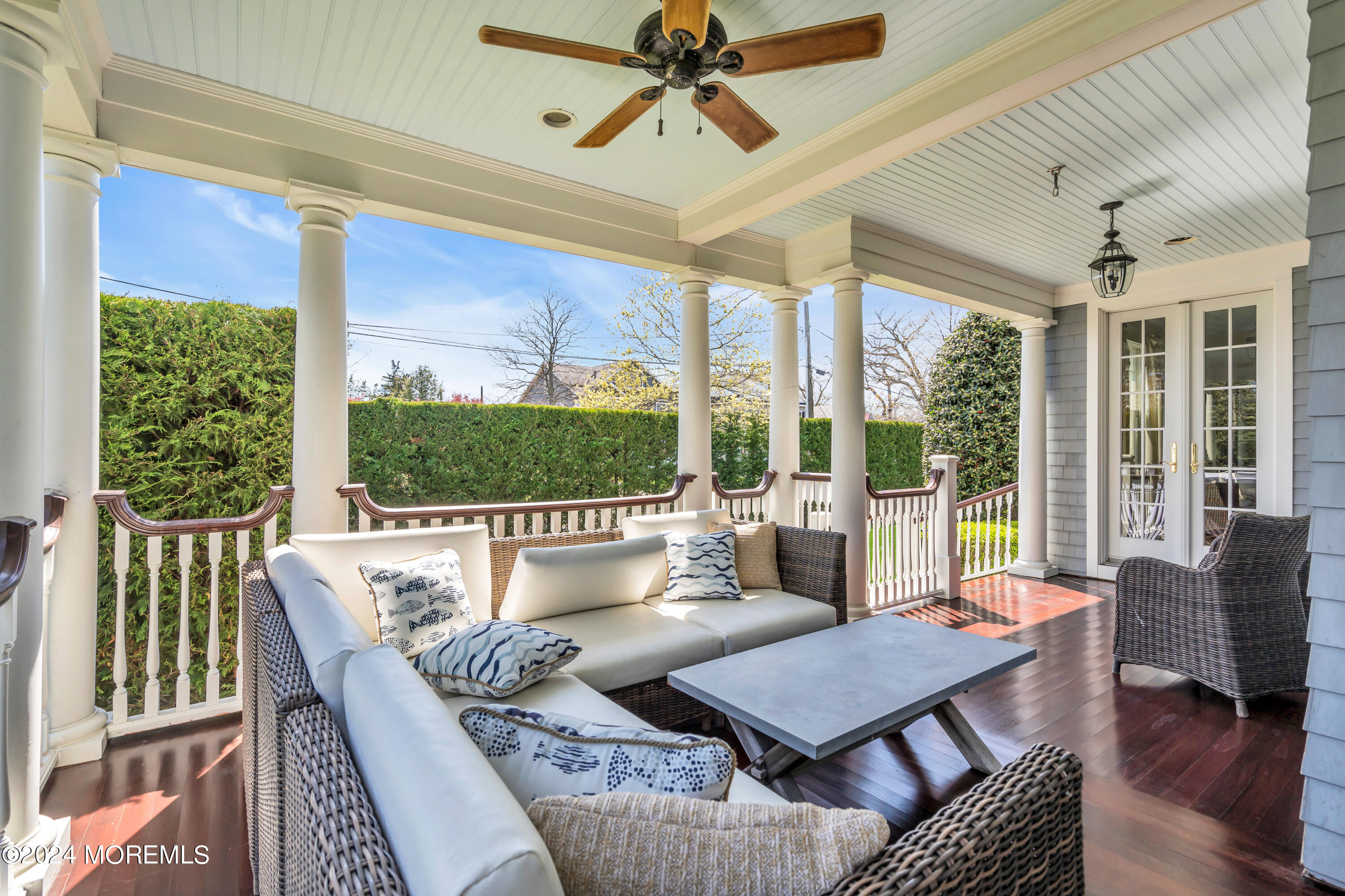 801 5th Avenue Spring Lake, NJ 07762 - Photo 91 of 97 a living room with furniture and a floor to ceiling window