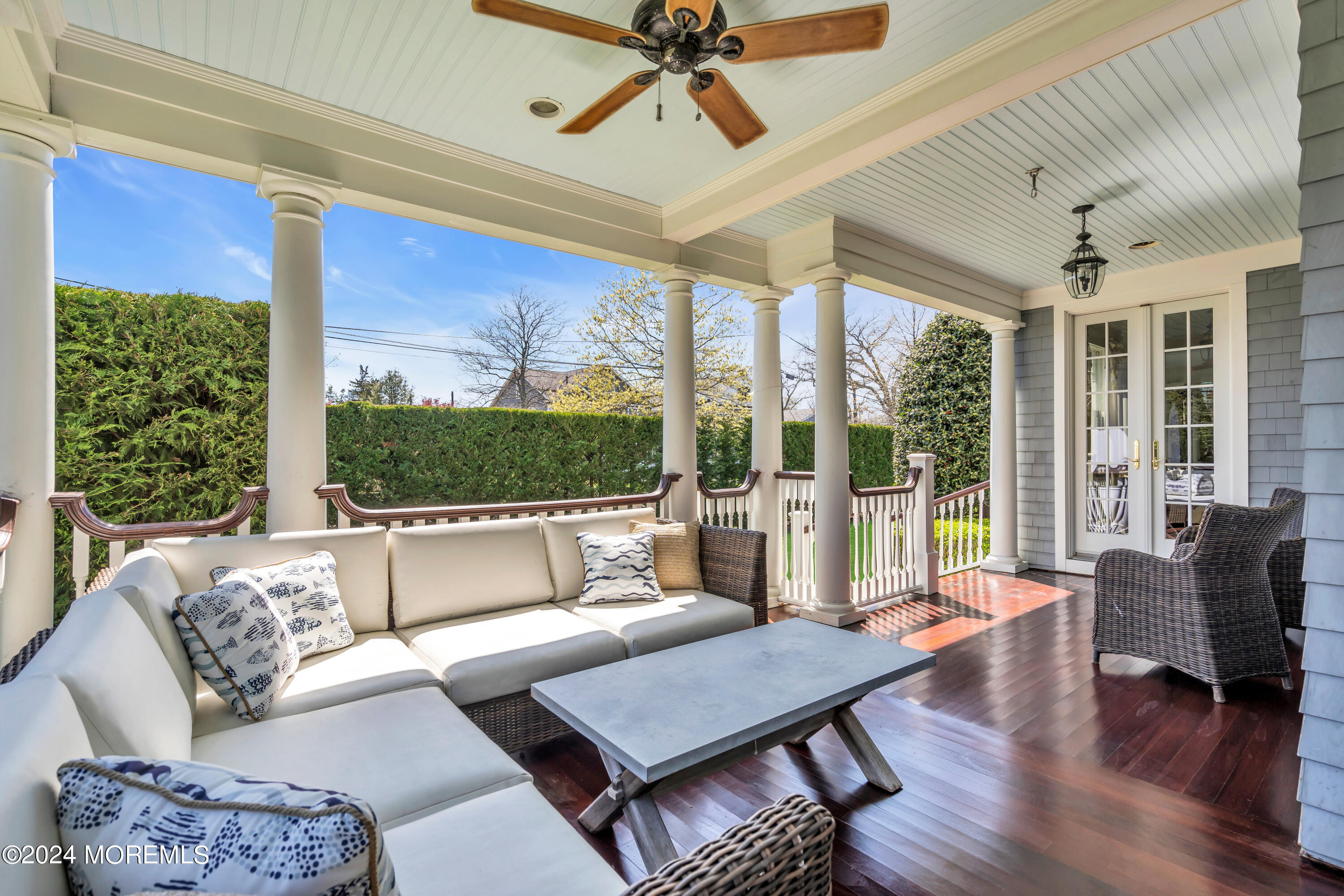 801 5th Avenue Spring Lake, NJ 07762 - Photo 92 of 97 a living room with furniture and a floor to ceiling window