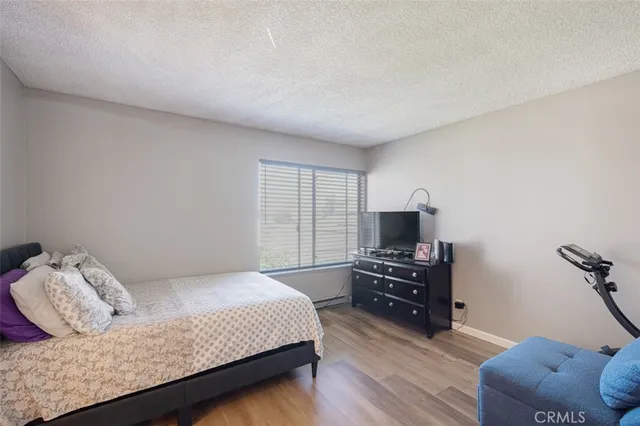 a bedroom with a bed and furniture