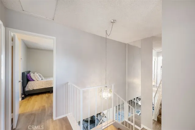 a bedroom with bed and walk in closet