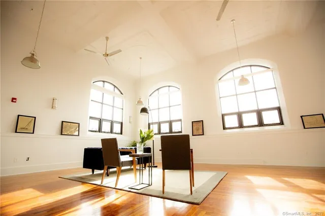 a view of a livingroom with furniture and window