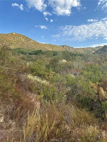 a view of an outdoor space and mountain view