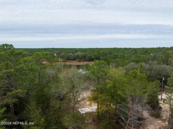 a view of a lake with a building in front of it