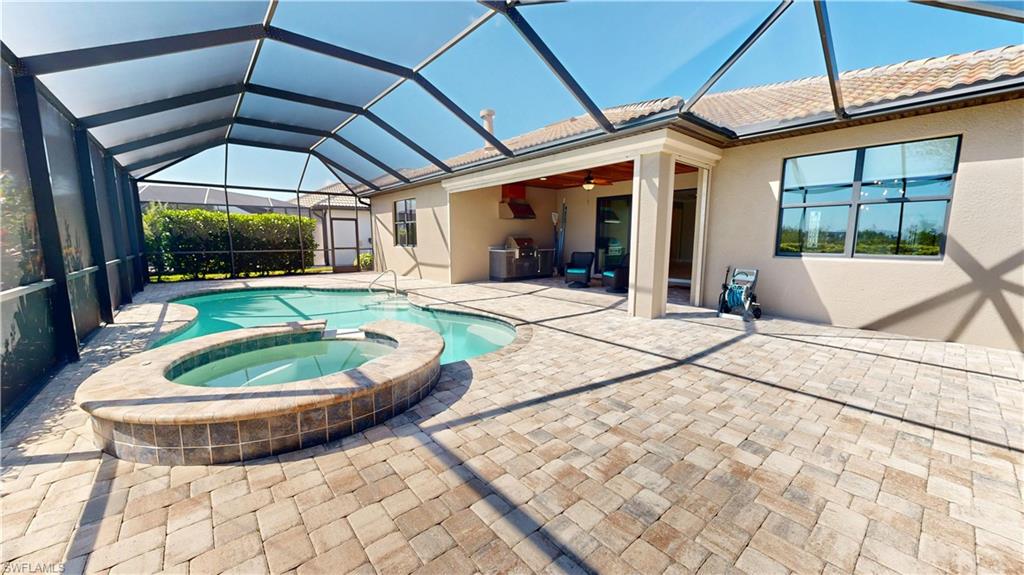 6354 Achievement Avenue Ave Maria, FL 34142 - Photo 23 of 50 a view of a swimming pool with a patio
